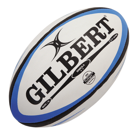 A gilbert brand rugby ball on a green background.