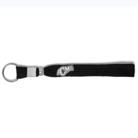 Black woven keychain with the word "Referee Whistle Wrist Lanyard by Acme Whistles" embroidered in white, featuring a metal key ring on one end.