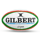 A Gilbert Super Rugby Americas 24 Replica Ball with green and red trim.