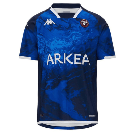 A blue Kappa Union Bordeaux Begles Rugby third jersey featuring a marbled pattern with the logo "arkea" on the front and the Union Bordeaux Begles team crest on the upper left side.