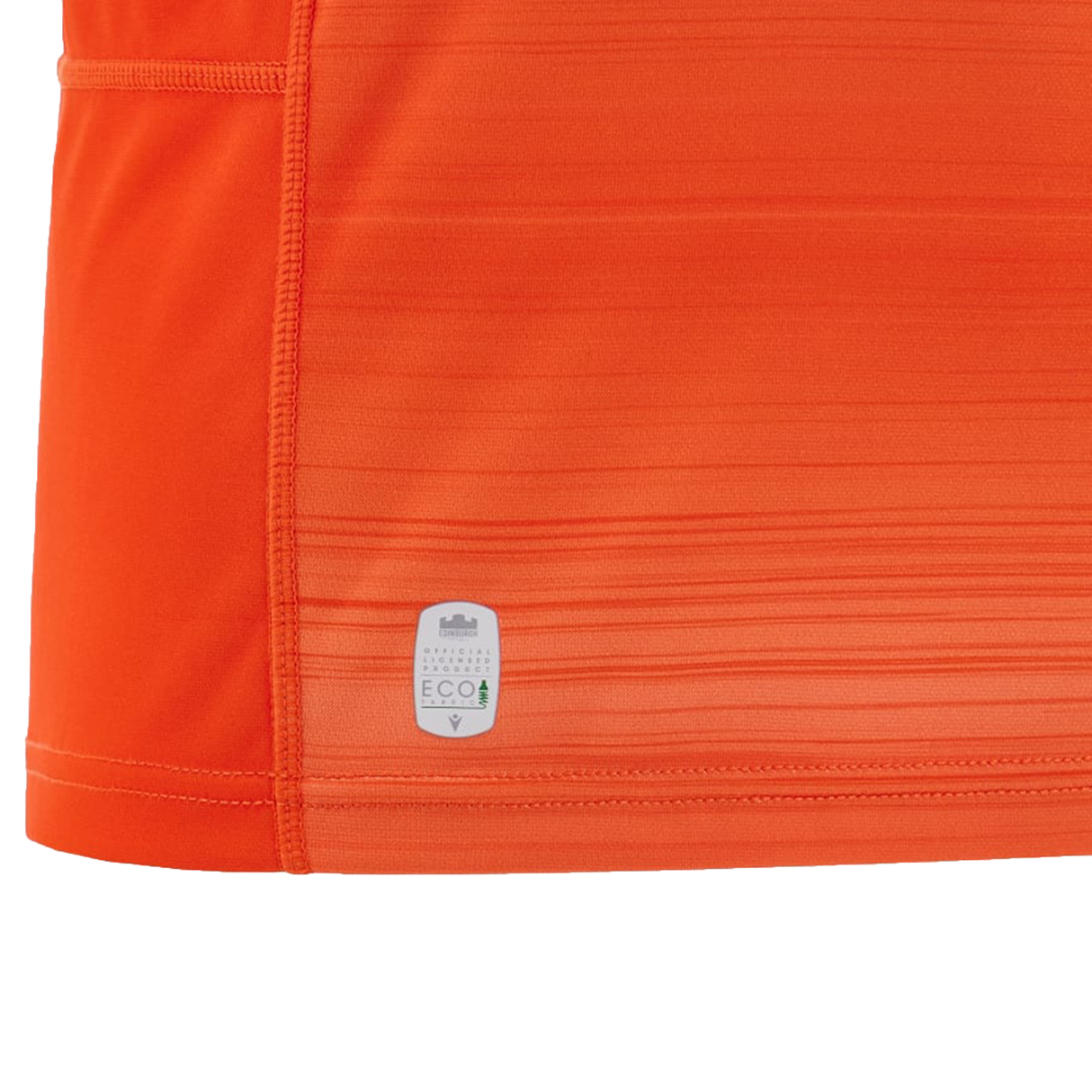 Close-up of an orange sports shirt with textured fabric, featuring a discreet "ECO" tag near the bottom hem, reminiscent of the Edinburgh Replica Away Jersey 24/25 by Macron in both style and detail.