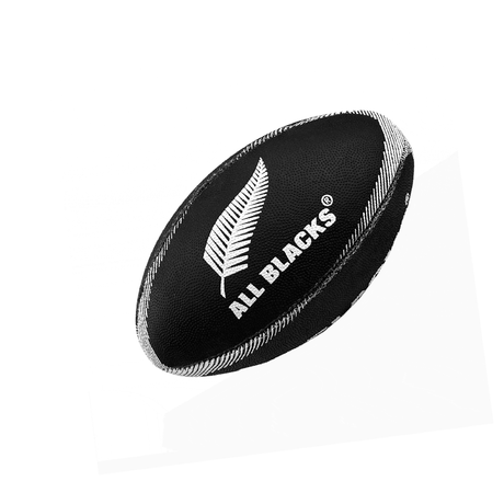 All Blacks Mini Supporters Ball by Gilbert features a black rubber compound outer surface, adorned with a white fern leaf logo and the text "ALL BLACKS" on a plain white background.