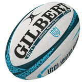 A close-up of a Gilbert United Rugby Championship Replica Ball, a piece of rugby memorabilia, with branding and patterned design elements from the United Rugby Championship.