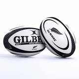 Two All Blacks Replica Balls by Gilbert with "Gilbert" and "All Blacks" logos on a white background.