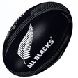 Close-up of a black All Blacks Supporter Ball by Gilbert with a silver fern design and the text "All Blacks" on it, set against a white background.