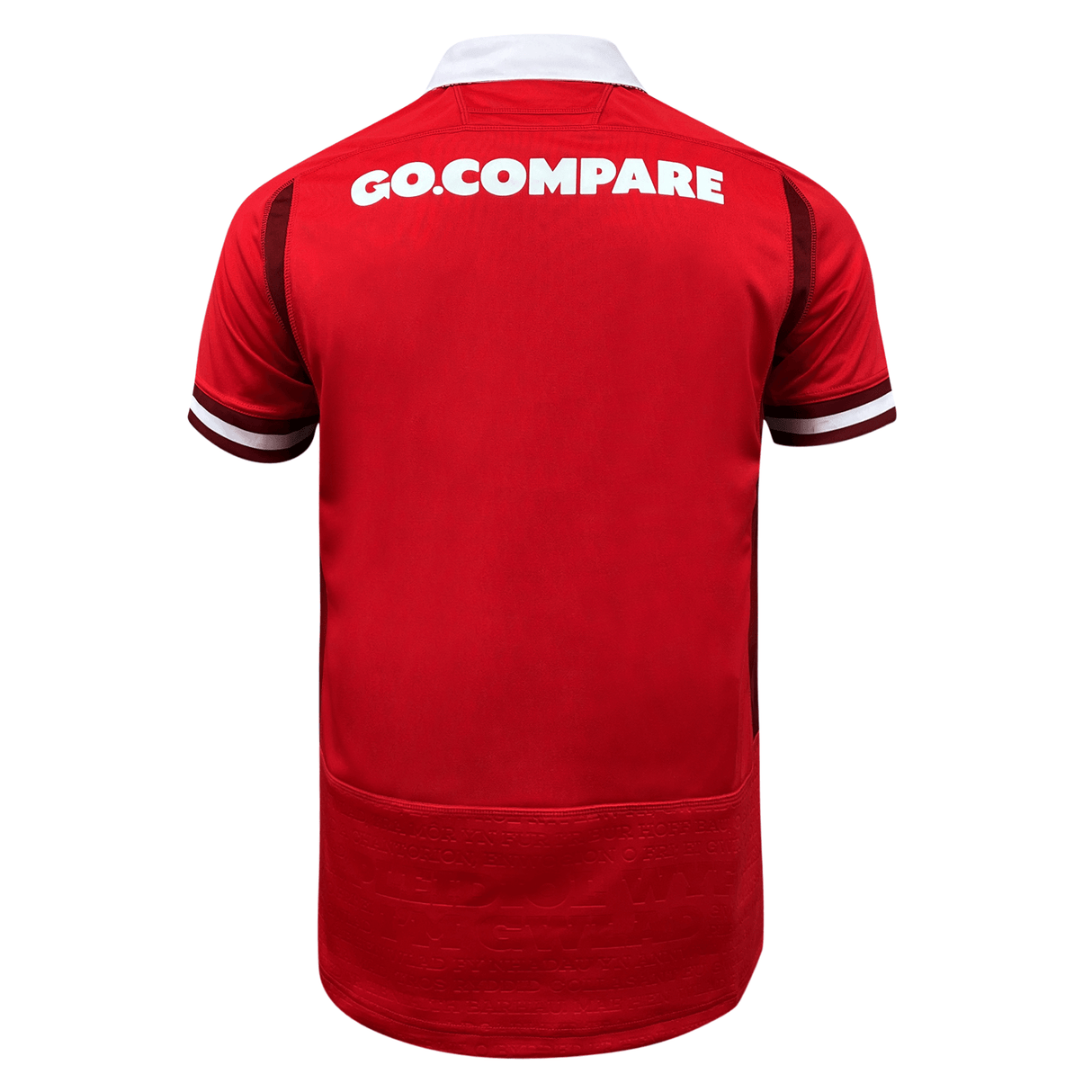 The back of a Macron Wales Rugby Union 23/24 Home Jersey with the words go compare on it.