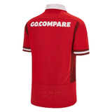 The back of a Macron Wales Rugby Union 23/24 Home Jersey with the word go compare on it.