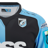 A black and blue Cardiff Blues Home Jersey 23/24 by Macron with a logo on it.