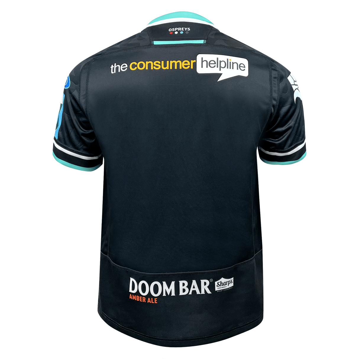 The image showcases the back of the black Ospreys Home Jersey 23/24 by Macron, featuring logos from "the consumer helpline" and "Doom Bar Amber Ale," with teal accents on the sleeves and collar. This athletic-fit sportswear jersey is crafted from high-tech fabric for optimal performance.