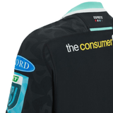 Close-up view of the back of a black Ospreys Home Jersey 23/24 by Macron featuring "the consumer" text, sponsor logos, and the team name. This athletic fit sportswear is crafted from high-tech fabric for optimal performance.