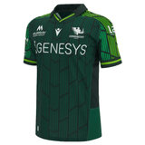 The Connacht 23/24 Home Jersey by Macron is a vibrant green sports jersey made from eco fabric, featuring bold vertical and diagonal stripes. It proudly displays the Connacht Rugby logo and sponsor names such as Genesys, embodying both team pride and sustainable style.