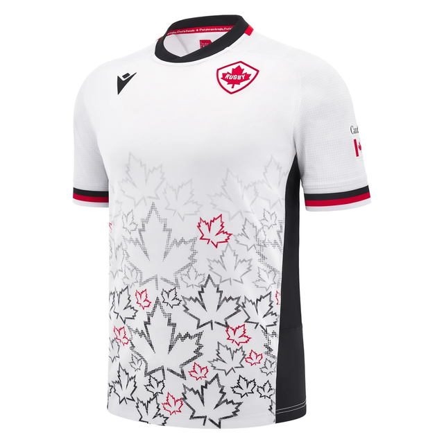 Macron's Canada 24/25 Away Jersey, in white with black and red accents, features a maple leaf pattern and chest badge.