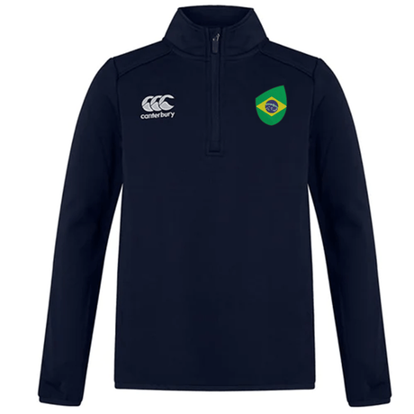 The Brazil Club Shield 1/4 Zip Training Top by EMB Canterbury is a navy long-sleeve rugby training top crafted from bonded fleece, featuring the iconic Canterbury logo and a Brazil-themed shield on the chest.