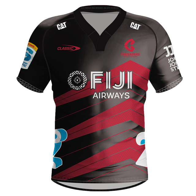 The Crusaders Super Rugby Away Jersey 24 by Classic Sportswear features a striking black and red design with "FIJI Airways" text and multiple logos including "CAT" and "JJ" on the sleeves and chest. This jersey for the Super Rugby 2024 season also boasts an anti-microbial wickable finish.