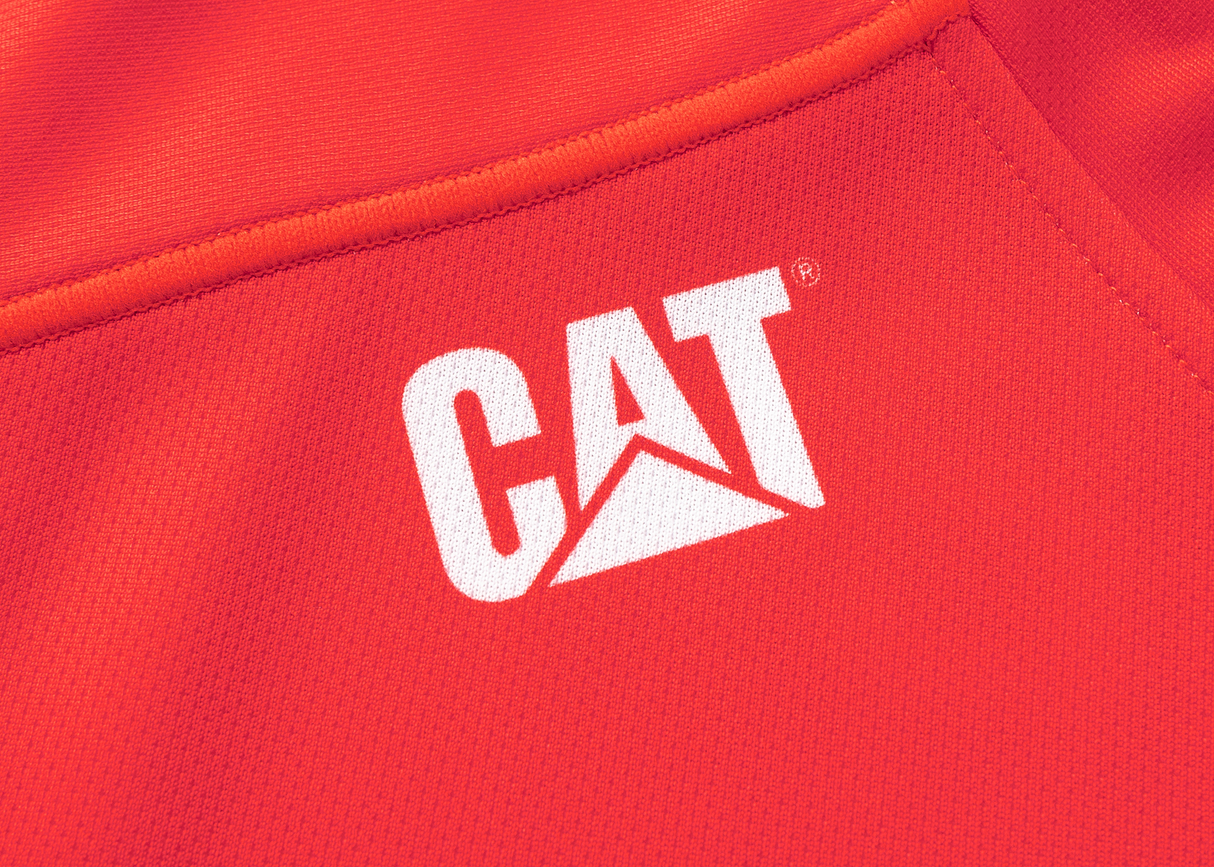 Close-up of a red fabric from the Crusaders Super Rugby Replica Home Jersey 25/26 by Classic Sportswear, featuring the white CAT logo with stylized lettering and a triangle design, reminiscent of vintage sportswear.