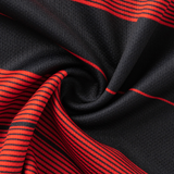 Close-up of the Crusaders Super Rugby Replica Away Jersey 25/26 by Classic Sportswear, showcasing a black and red design with swirling patterns.