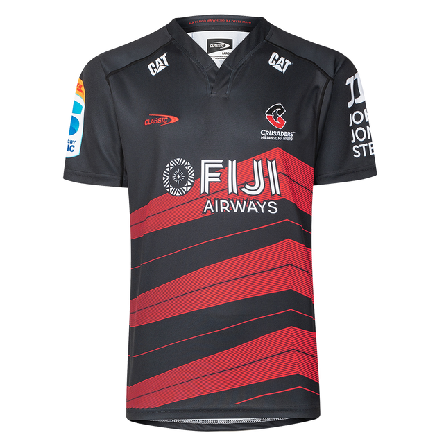 The Crusaders Super Rugby Replica Away Jersey 25/26 by Classic Sportswear is a classic sportswear piece featuring a bold black and red design with sponsor logos.