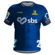 A Highlanders Super Rugby Home Jersey 24 by Classic Sportswear featuring a blue rugby jersey with the "Highlanders" logo, "Pride of the South" text, "SBS Bank" sponsor, and various other accent logos on the sleeves and chest—a true embodiment of the Super Rugby 2024 Home Jersey.