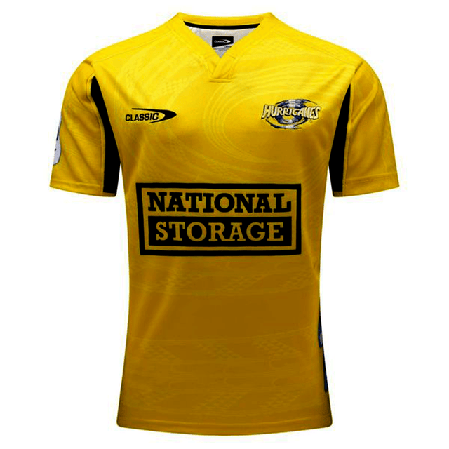 Yellow sports jersey with "national storage" logo, Hurricanes Super Rugby 2024 Home Jersey and Classic Sportswear brand tags visible.