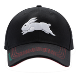 The Rabbitohs NRL 2025 Media Cap by Classic Sportswear showcases a sleek black design with an embroidered white rabbit on the front and red stitching on the visor. Crafted from quick-drying polyester, it ensures both comfort and convenience with its adjustable Velcro closure for a perfect fit.