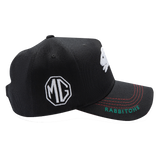 The Rabbitohs NRL 2025 Media Cap by Classic Sportswear is a black baseball cap featuring the MG logo and 'Rabbitohs' text, with a white rabbit silhouette on the side. Made from quick-drying polyester, this cap includes red stitching on the brim and has an adjustable Velcro closure to ensure a perfect fit.