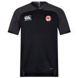 The Chico Oaks Vapodri Evader Jersey by EMB Canterbury is a black rugby jersey with short sleeves, featuring the Canterbury logo on the right chest and a red and white circle emblem on the left. It has VapoDri for superior moisture-wicking to keep you cool and dry.