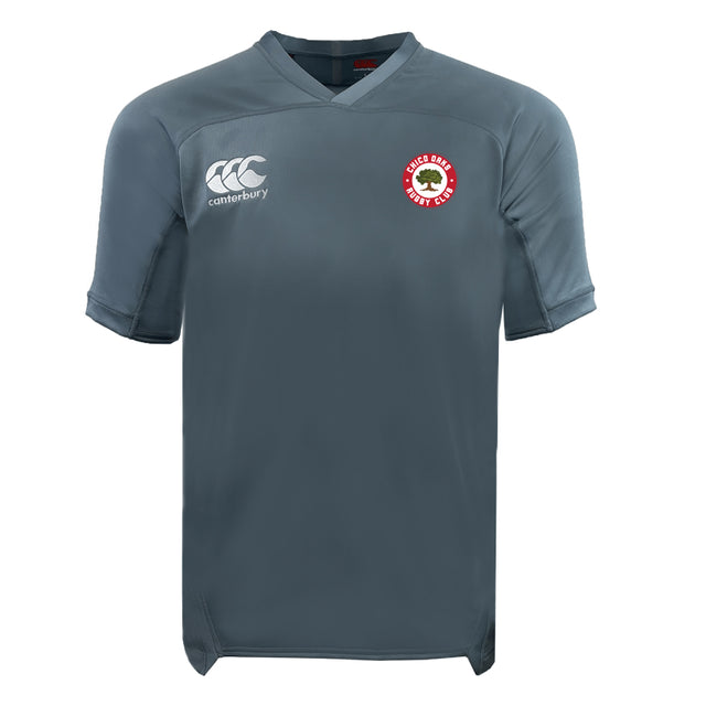 The Chico Oaks Vapodri Evader Jersey by EMB Canterbury boasts a classic gray design with a white "Canterbury" logo on the right chest and a red and white crest on the left. Its moisture-wicking VapoDri technology keeps you cool and dry during intense matches.