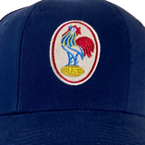 The France Rugby League 1951 Cap by Ellis Rugby features a blue design with a rooster emblem embroidered in red, blue, and white on the front panel.