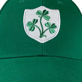 Crafted from organic cotton, the Ireland Rugby 1948 Retro Cap by Ellis Rugby features a green design with a white shield and an embroidered three-leaf clover on the front.