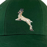 Springboks Rugby 1937 Cap by Ellis Rugby, featuring an embroidered jumping antelope on the front, celebrates the legacy of Springboks Rugby.