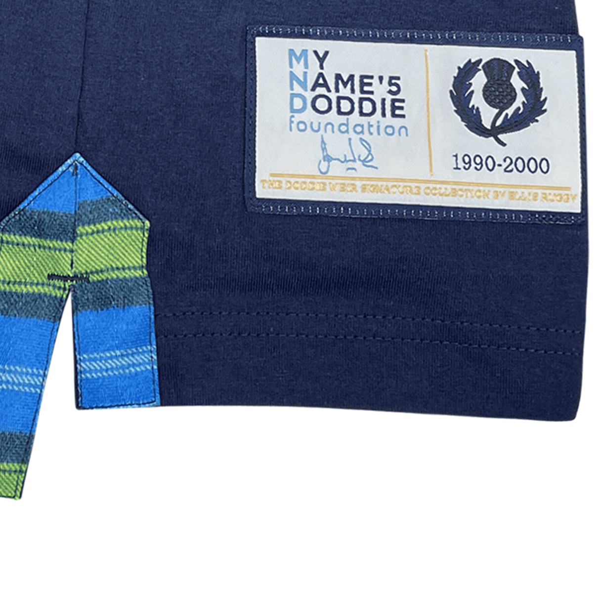 A Doddie Weir Polo by Ellis Rugby with a logo on it.