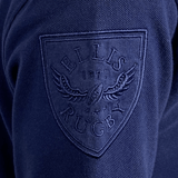 The back of a blue Doddie Weir Polo by Ellis Rugby with the Ellis Rugby logo on it.