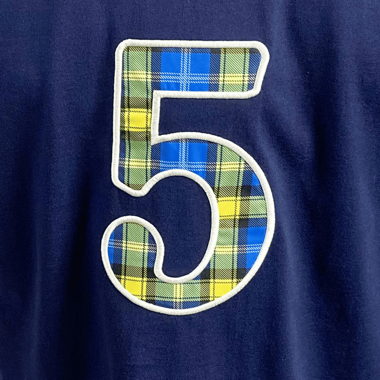 A Doddie Weir T-Shirt by Ellis Rugby with the number five on it.