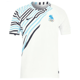 A white short-sleeve Fiji Olympics 7's Replica Home Jersey by Nike featuring black and light blue stripes on the shoulder and chest, a Nike logo, Olympic rings, and a stylized torch emblem. This Fiji Olympics 7's Replica Home Jersey by Nike is made of rugby ready fabric for ultimate performance.