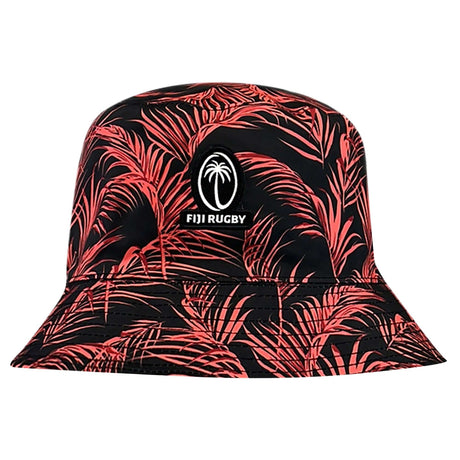 The Fiji Reversible 24/25 Bucket Hat by Nike features a chic pink palm leaf design set against a black backdrop and is accented with the white Fiji Rugby logo. With its 360-degree sun coverage and sweat-wicking technology, this hat ensures comfort and style all day long.