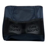 A Highlanders Super Rugby Zipper Boot Bag by DryWorld in navy blue mesh, containing two gray New Balance shoes with the brand's logo visible.