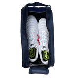 A pair of white athletic shoes with pink and black accents are neatly placed inside a Highlanders Super Rugby Zipper Boot Bag by DryWorld, perfect for fans.