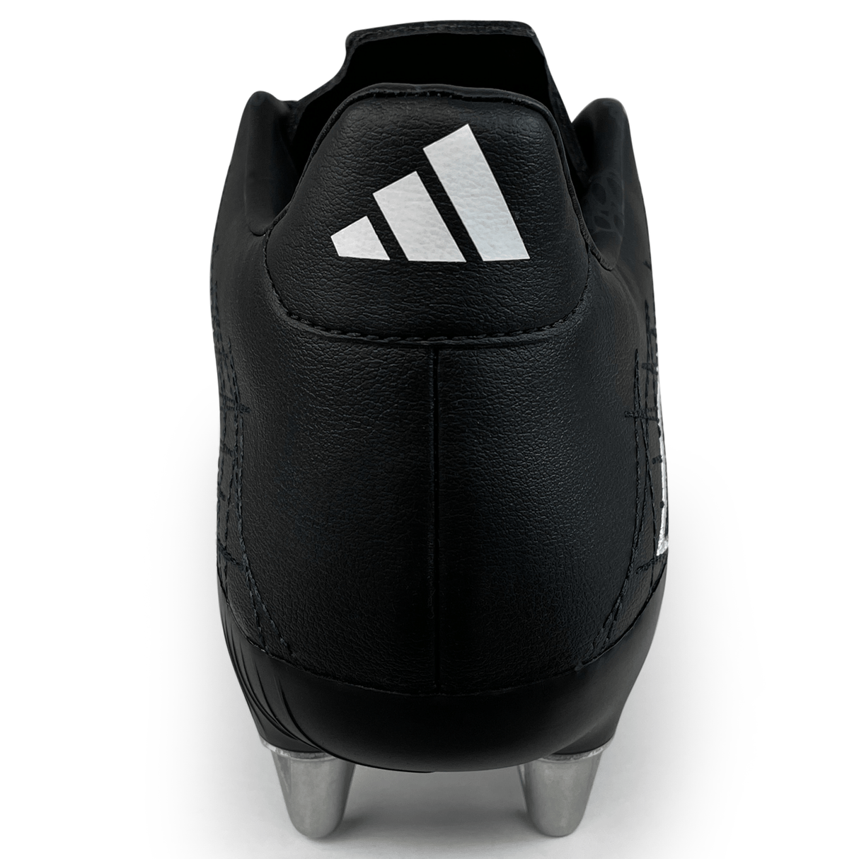 Close-up image of the back of a Core Black adidas Kakari Elite SG '23 Rugby Cleat with silver studs and a white triangular logo near the heel. Designed for Rugby, this cleat features eco-friendly performance crafted using recycled materials.