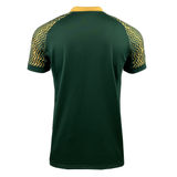 The Springboks Sevens Stadium Home Jersey by Nike showcases a vibrant green design with a yellow collar and zigzag patterned sleeves, as seen from the back.