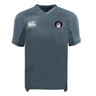 The EMB Canterbury Helena Youth Rugby Vapodri Evader Jersey is gray with short sleeves, featuring moisture-wicking Vapodri technology. It displays the Canterbury logo on the right shoulder and a circular emblem on the left chest.