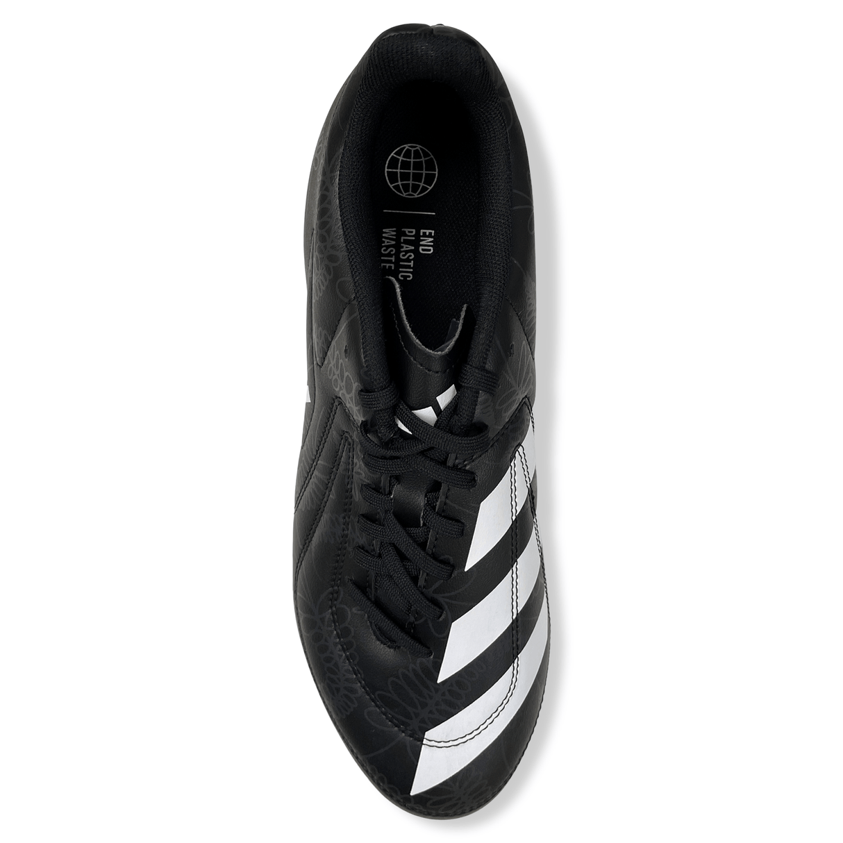 Top view of the black and white adidas RS15 SG 23 - Core Black/White/Carbon soccer shoe with the text "End Plastic Waste" and a globe icon on the insole, reminiscent of the innovative design seen in the adidas RS15 Soft Ground Rugby Cleat.