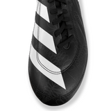 Close-up image of an adidas RS15 SG 23 Rugby Cleat in Core Black, White, and Carbon, featuring signature white stripes and black laces. The surface showcases subtle black floral patterns and is photographed from an overhead angle.