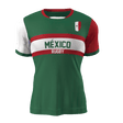 The Nations of Rugby México Supporters Jersey by Admiral features a vibrant green, red, and white design with "México" and "Rugby" boldly printed on the front, complemented by a small Mexican flag. It's the perfect way to show your pride for Mexico's rugby team.