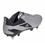 The adidas Adizero RS15 Pro SG in Silver Metallic/Core Black/White is a multifunctional shoe that blends the style of a gray and black soccer cleat with the practicality of a rugby boot. It is equipped with studs on its sole for soft ground performance and showcases a unique striped logo on the side.