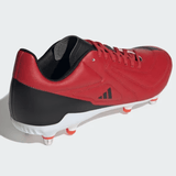 The adidas RS15 SG 24 - Better Scarlet/Core Black/Solar Red, viewed from the back angle, showcases metallic studs, a Speedframe outsole, and a lightweight synthetic forefoot.