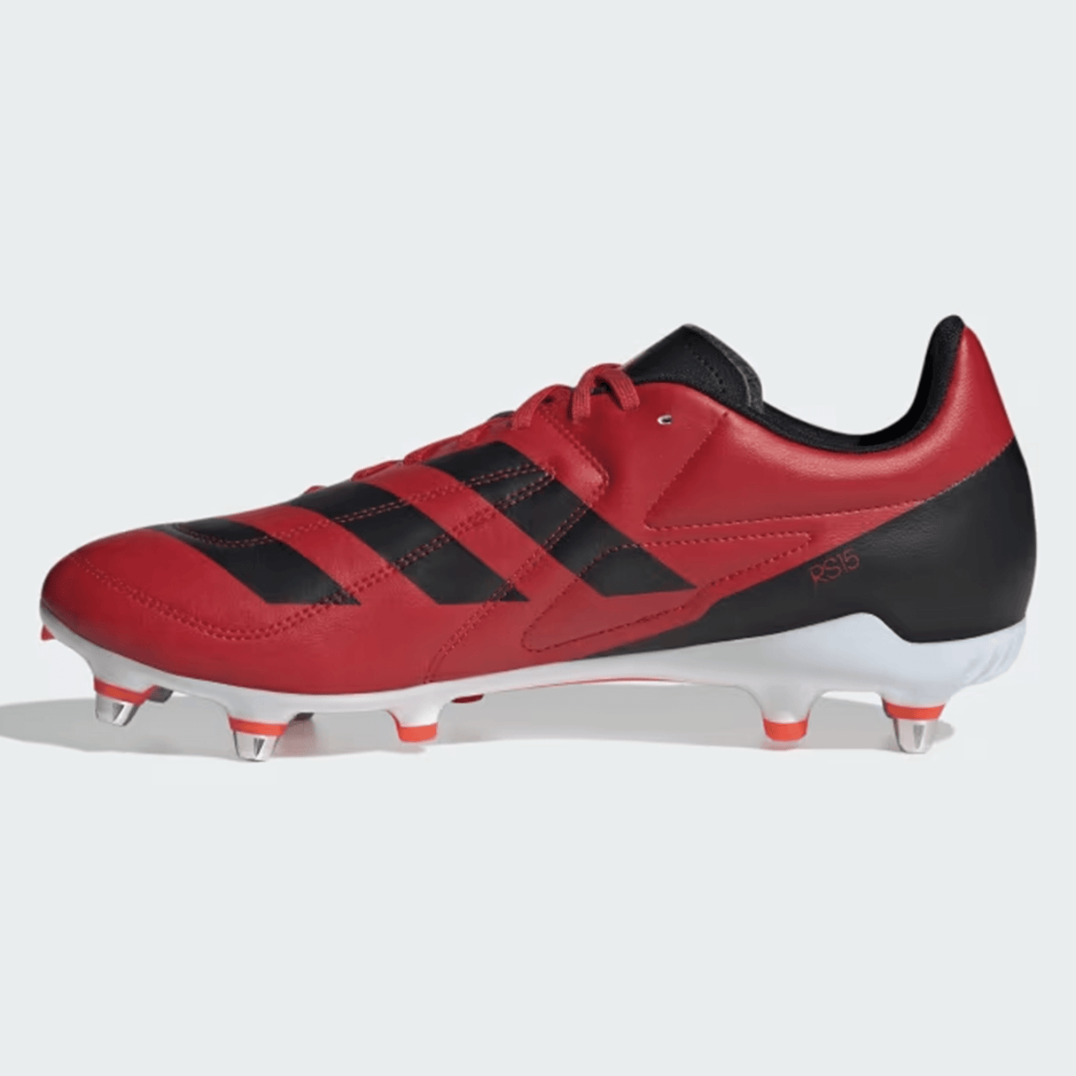 Experience enhanced performance on the field with the adidas RS15 SG 24 rugby cleat. Available in a striking Better Scarlet/Core Black/Solar Red colorway, these cleats feature metal studs and a white sole for optimal grip. The lightweight synthetic forefoot increases agility, while the Speedframe outsole provides exceptional traction. Designed by adidas for superior play on soft ground surfaces.