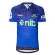 Blue and navy patterned sports jersey with "Blues Super Rugby" logo, features "nib" sponsor in green, crafted by Classic Sportswear.