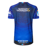 The back of the Blues Super Rugby 25/26 Replica Home Jersey by Classic Sportswear displays "Barfoot & Thompson" prominently. It features logos on both sleeves, and "We Are the Blues" at the bottom, embodying the Blues spirit.