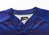 Close-up of the Blues Super Rugby 25/26 Replica Home Jersey by Classic Sportswear, featuring a blue and purple pattern. The collar tag reads "Classic Sportswear" and "Large," capturing the bold spirit of Blues Super Rugby.