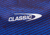 The fabric features a blue diagonal pattern with "CLASSIC" embroidered in white, similar to the Replica Home Jersey, and a stylized curve from the "C". Product: Blues Super Rugby 25/26 Replica Home Jersey. Brand: Classic Sportswear.